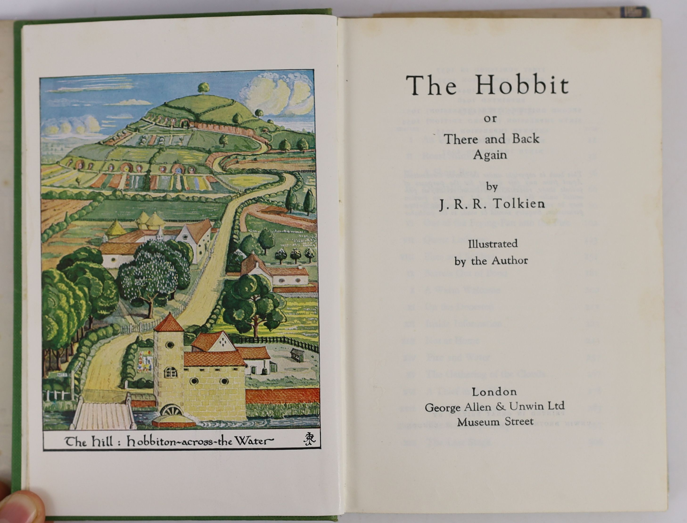 Tolkien, John Ronald Reuel - The Hobbit, 2nd edition, 9th impression, with colour frontispiece, map endpapers, original green cloth in unclipped d/j, with loss to foot of spine, bookplate to half title, covering an earli